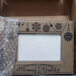 New picture frame leather like look our first Christmas as mommy & daddy…